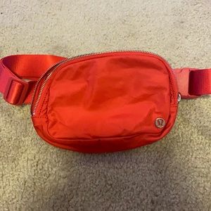 Red lululemon Fanny pack. Mesh material
